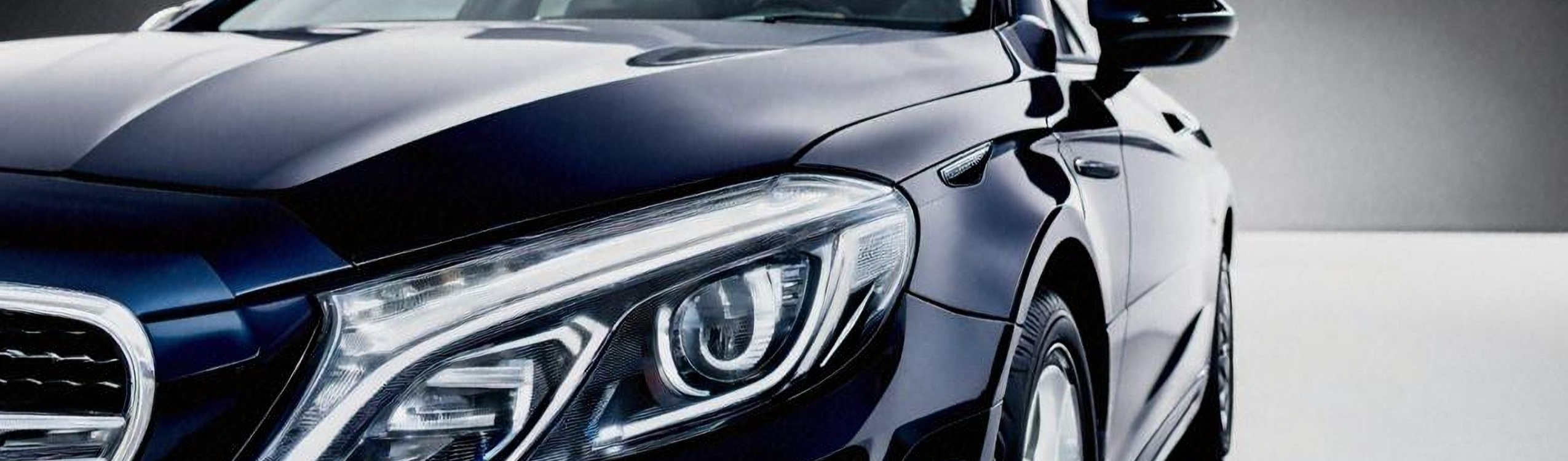 Close-up of new car in white showroom – fca redress sheme