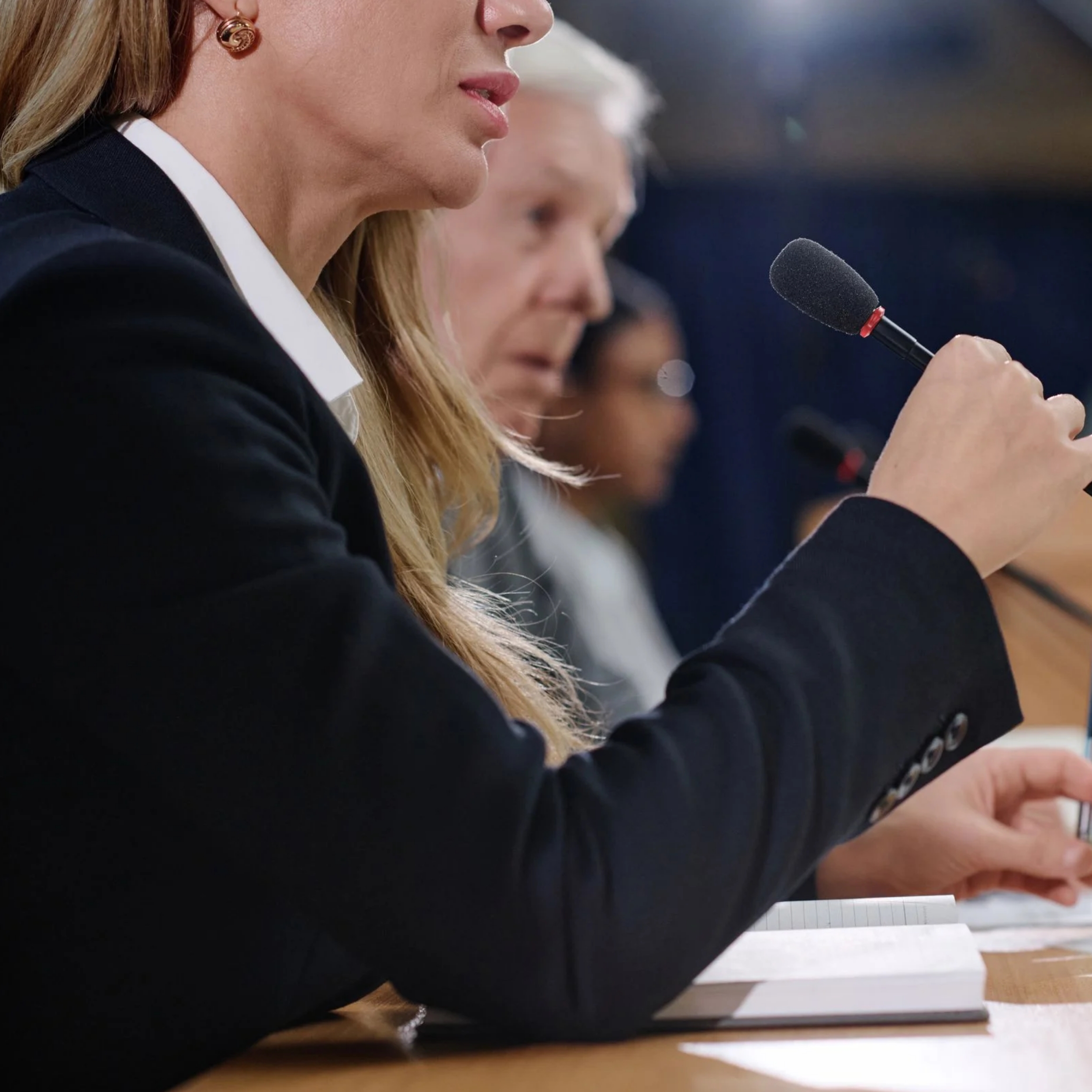 Officials speaking at a regulatory hearing about the FCA car finance compensation delay